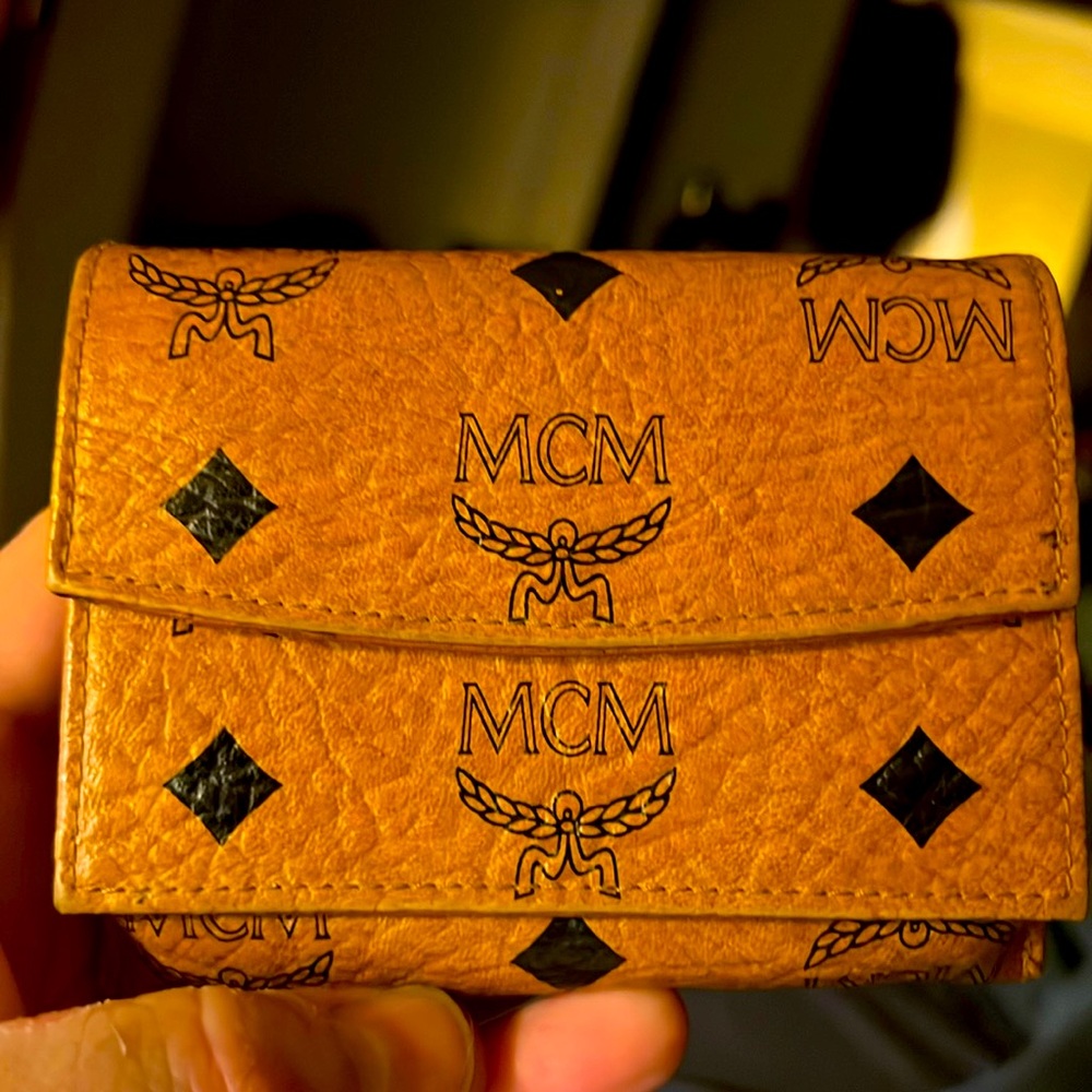 MCM TRIFOLD WALLET It was a gift and I have never carried it. It looks new.